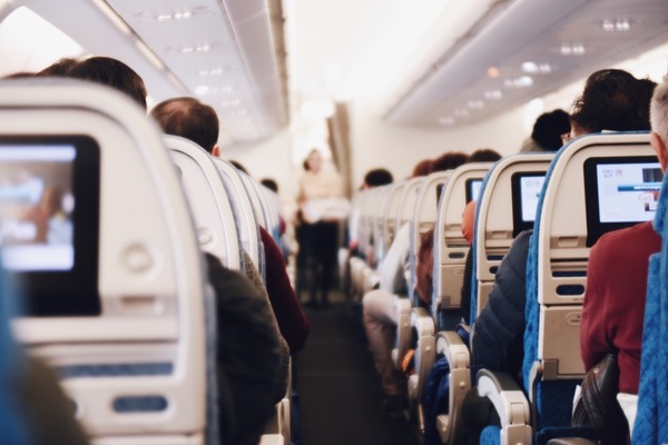 Do airlines deliberately split up passengers who refuse to pay extra for allocated seating?